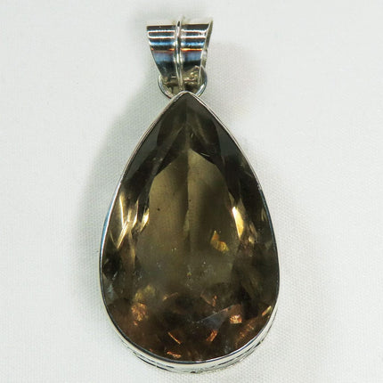 Smoky Quartz Tear Drop Sterling Silver Pendant Jewelry against a white background