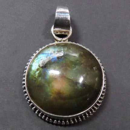 Labradorite Round Cab Sterling Silver Pendant Jewelry on a dark gray background