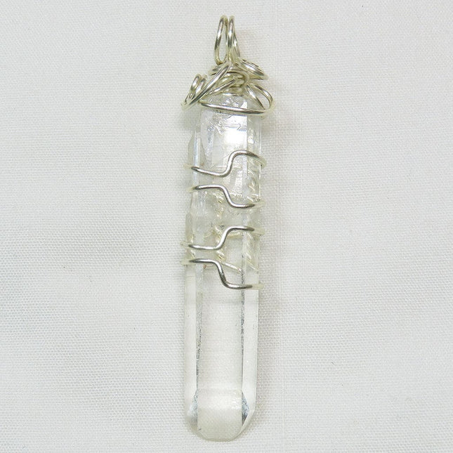 Grounding Quartz Crystal from Arkansas Wire Wrapped Pendant Jewelry on a white background