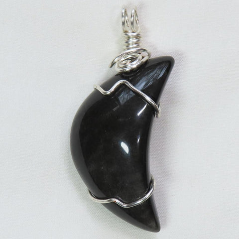 9j8403 - Obsidiana con brillo plateado