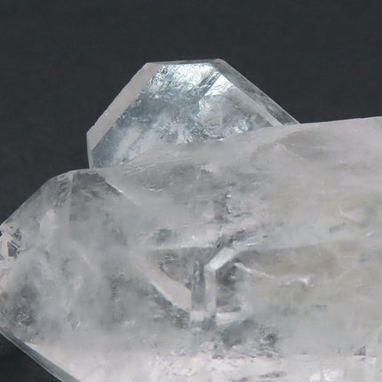 Tabby Point on Quartz Crystal DT on a dark background