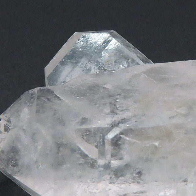 Tabby Point on Quartz Crystal DT on a dark background