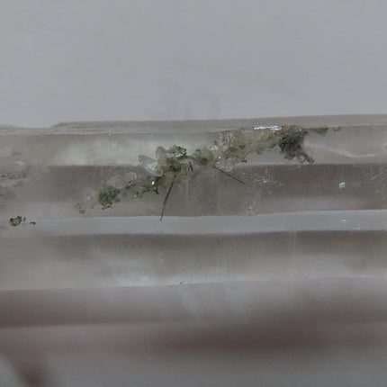 Close-up of Chlorite & Black Tourmaline Needles Included in Clear Lemurian Seed Quartz Crystal Point