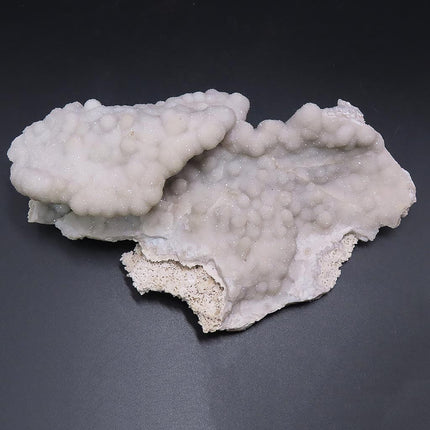 Sparkling Silver Grey Botryoidal Drusy Quartz Specimen from Missouri on a dark background