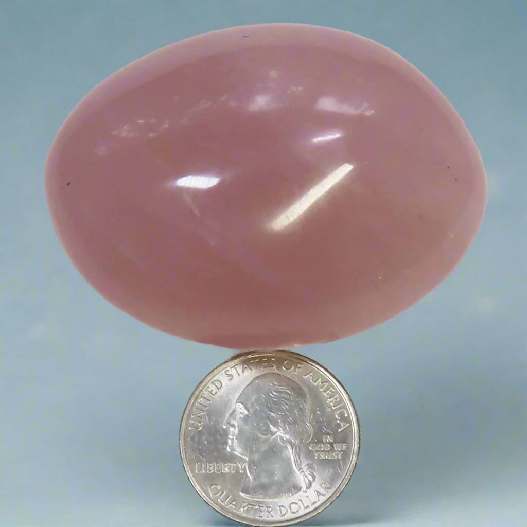 Polished Rose Quartz Crystal Palm Stone from Madagascar