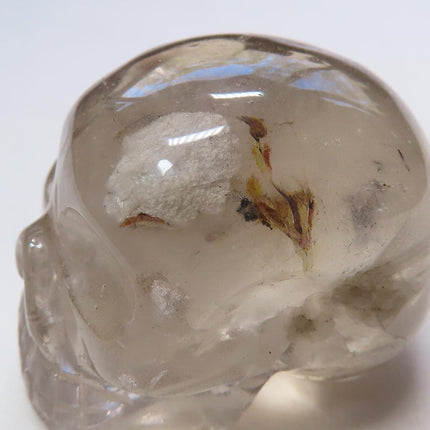 Carved Smoky Quartz Crystal Skull with Included Rock & Iron Oxide