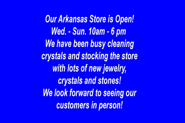 Promotional message about an Arkansas store opening hours and store activities on a blue background.