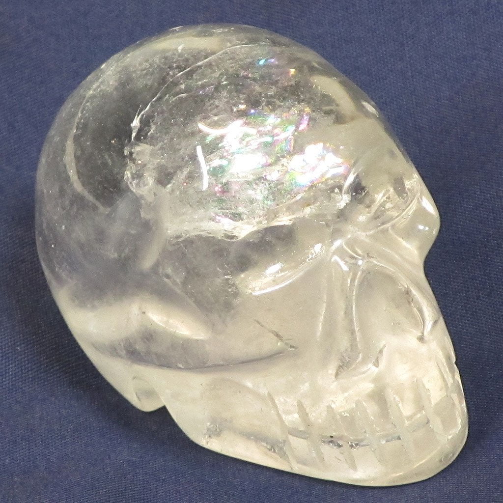 Carved Clear Quartz Crystal Skull with a Rainbow